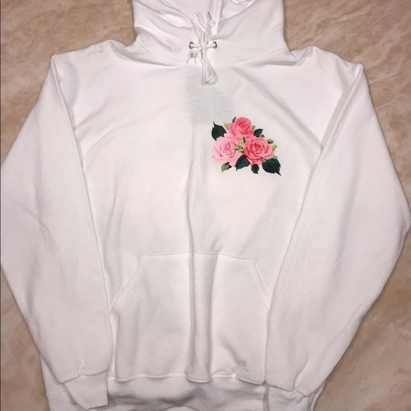 white sweatshirt with roses